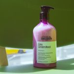 Close-up du shampoing L'Oréal Liss Unlimited en lumière naturelle, idéal pour des visuels de soins capillaires.